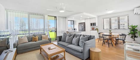 The open plan living area is light-filled and spacious.