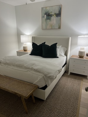 Downstairs bedroom complete with queen bed and blackout shades. 