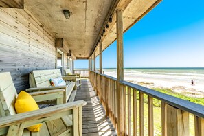 Sit back and enjoy the great beachfront views from the covered deck
