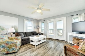 Bright and airy living area with wall of windows