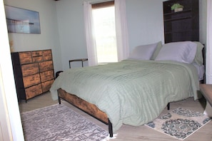 Master bedroom with queen bed, (optional pack-n-play, full closet and dresser.