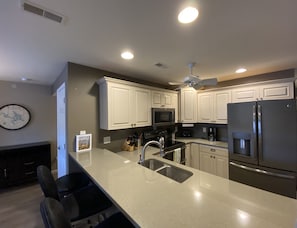 Breakfast bar and kitchen. 