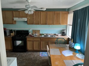 Indoors, Floor, Flooring, Kitchen, Chair