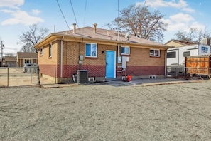 Your entrance through the back yard. And huge lot with endless possibilities!
