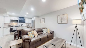 New couch and modern lighting