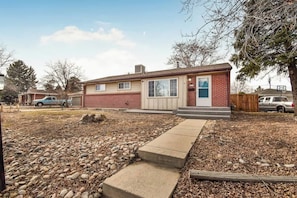The front yard offers a welcoming and well-maintained outdoor space, perfect for relaxing or enjoying the fresh air. It provides a charming first impression of the home, with plenty of room to unwind or take in the surroundings.
