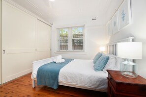 Main bedroom - queen size bed with built in wardrobes