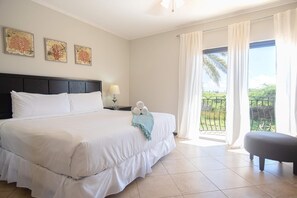 A cozy escape! Our bedroom is the perfect spot to snuggle up and unwind. With view from the balcony.