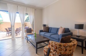 Discover relaxation in our beautifully designed living room.