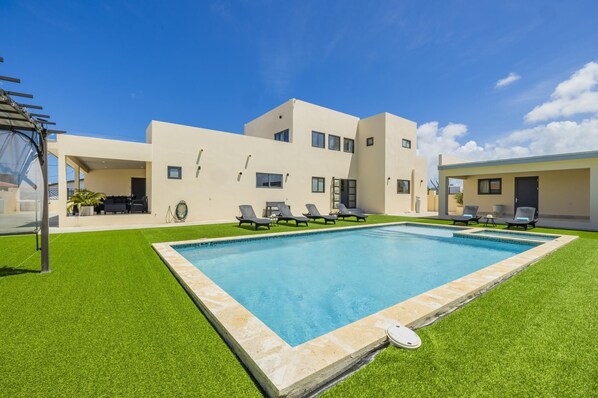 Enjoy your own private pool with a sitting area and jets.