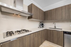 A living room and dining room space that has a bright interior, and minimalist interior design.