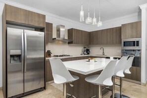 Modern and sleek living/dining/kitchen area.