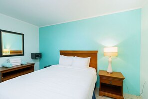 An air-conditioned bedroom with comfortable bed