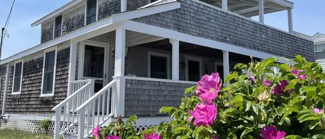 Huge wrap around covered porches with ocean and marsh views and plenty of lounge furniture to enjoy it all