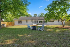 HUGE fenced in backyard with firepit & patio
