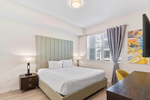 Exquisite bedroom of the condo at Vista Cay Resort - Indulge in a serene sanctuary with a relaxing double bed - Unwind and recharge amidst cozy comforts elegant Decoration - Smart TV and Netflix Available for the entertainment