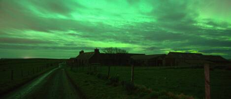 Aurora behind the clouds!