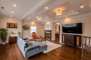 Entry - Living Room - Game Cabinet/Bar/Fireplace