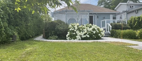 View of the cottage across from the lake