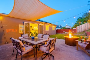 Outdoor Dining Area With Firepit