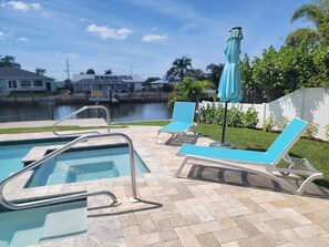 Lay out chairs by the pool.