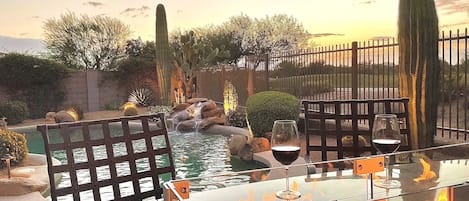 Enjoy the sun’s fiery kiss at night from the poolside cantina
