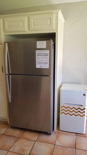 Full-size refrigerator / freezer with ice maker; Beverage refrigerator