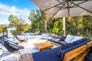 Rooftop patio perfect for relaxing in the sun.