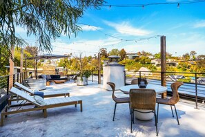 Rooftop patio for lounging.