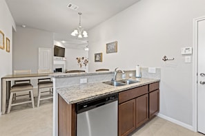 An open-concept kitchen area will allow for nice conversation while cooking