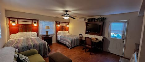 2 Queen Size beds & a Sofa Bed in the common area, & a private bedroom with Queen Size Bed, Clean fresh cotton sheets & linens. Full Bathroom with Tub & Shower. There is also a double vanity! There's a full Kitchen, Desk & Flat Screen TV