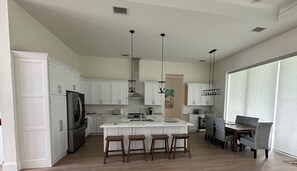 Kitchen, dining, beverage center. 