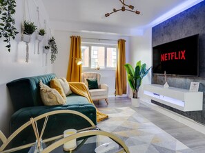Living room  - 50'  Smart TV loaded with Netflix, HDMI cable, ambient lighting,  extra fast wifi & a Pool table - Complimentary tea & coffee available for your enjoyment
