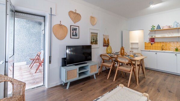 Colorful living/dining area with access to the balcony #lovelystay #airbnb
