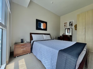 Queen bedroom whole room view