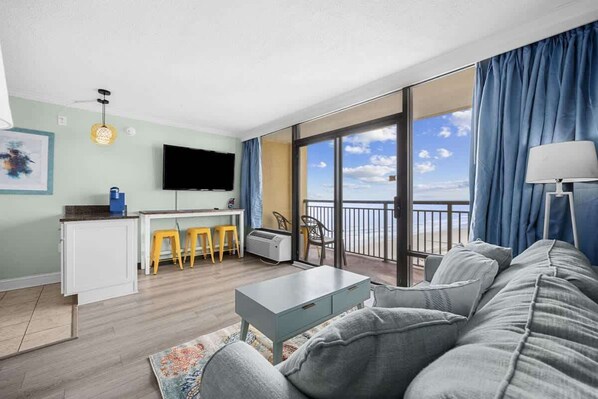 Kick back in a cozy, coastal living room made for relaxation.
