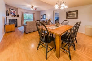 Spacious dining area seats 6 and opens to living room