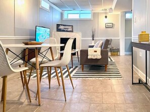 Cozy living room off the dining nook (fireplace is for decorative use only).