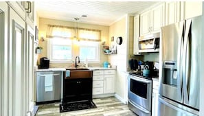 Kitchen has the usual appliances + a small kitchen cart & 2 stools (not shown).
