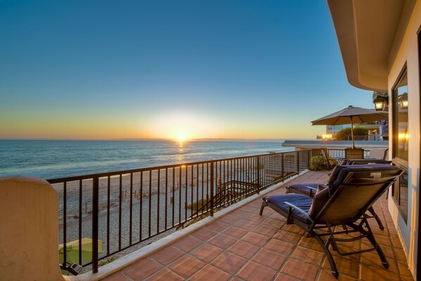 Enjoy the sunset on your private oceanfront patio