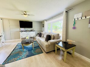 Living Room with Comfy Couch and Large TV