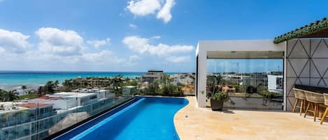 There’s an awesome rooftop lounge area and year-round infinity pool with sea views