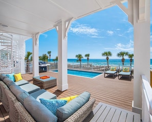 Enjoy the sounds of the surf while relaxing on your gulf-front patio beside your heated pool.