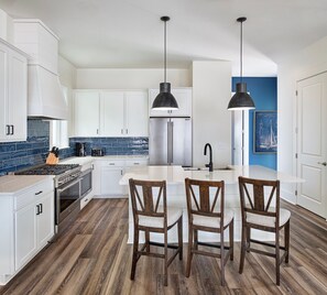 Cook up a storm in our chef-inspired open kitchen, fully equipped with modern appliances.