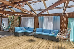 Pool House Seating = a chair swing, lounging couch, hammocks, + extra seats.