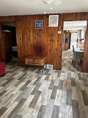 View from the front door through Living room into Kitchen