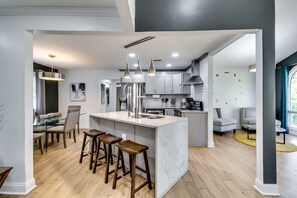 Kitchen #1
Central located in the open space of the home upstairs. 