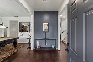 Welcoming foyer w/ a digital concierge/guest book. Full of information for guest