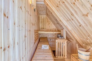 Lovely sauna with outdoor entrance