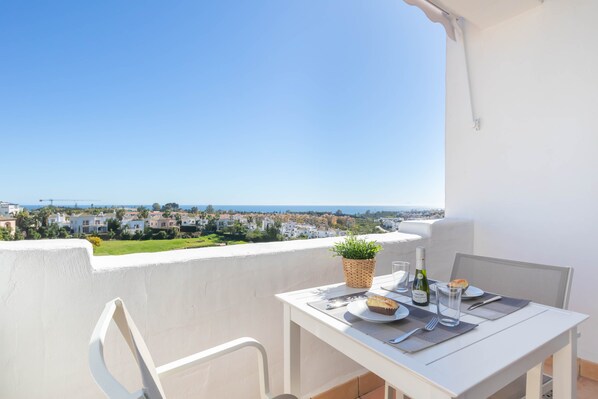Breakfast on sunny terrace